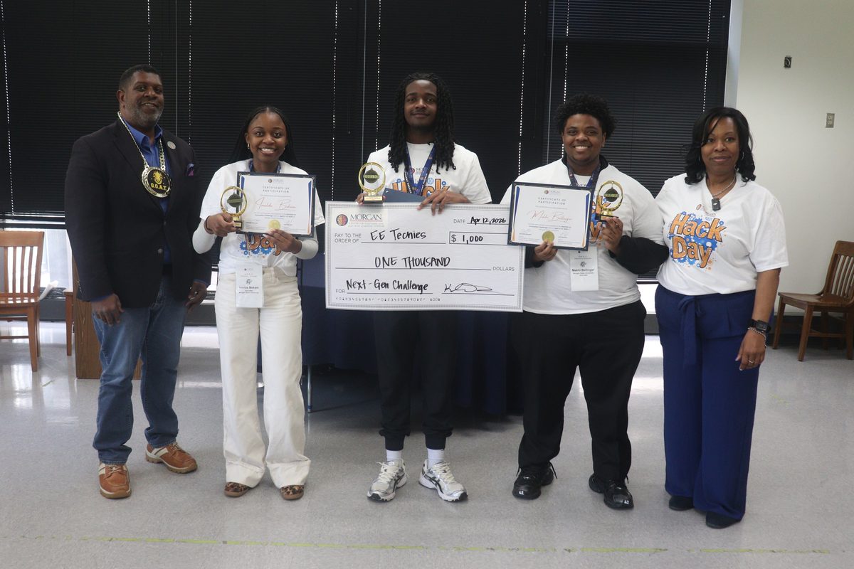 Team EE Techies holding certificates, trophies, and a $1,000 check at the NextGen AI Innovation Challenge at Morgan State University